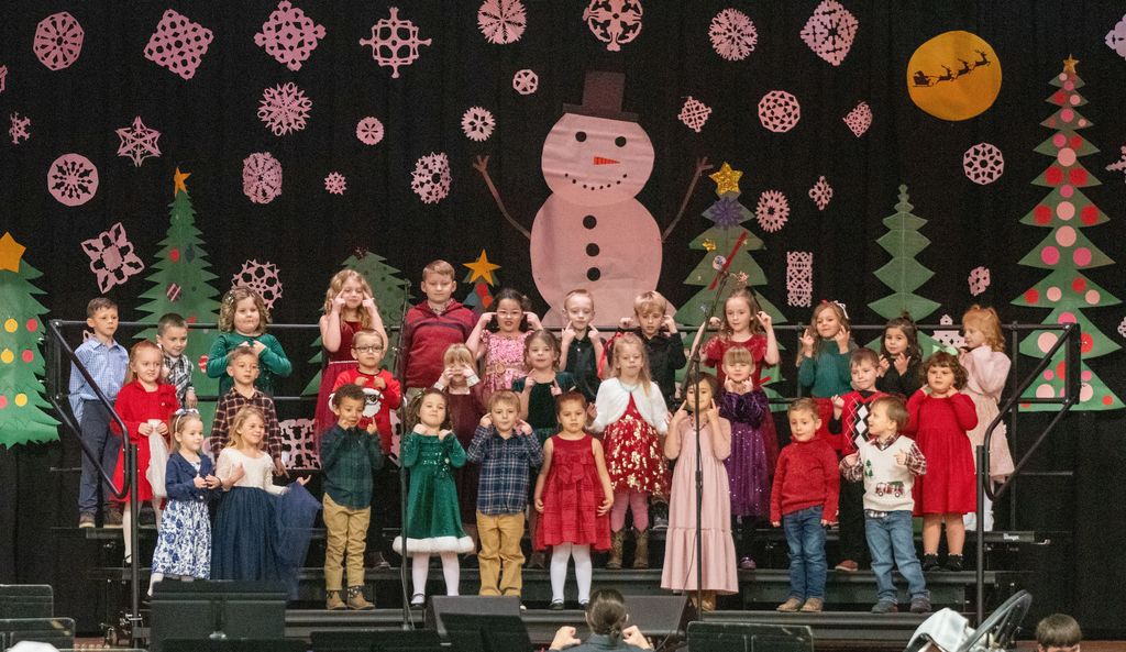 Union Star primary school students perform a vocal arrangement onstage during the Christmas concert.