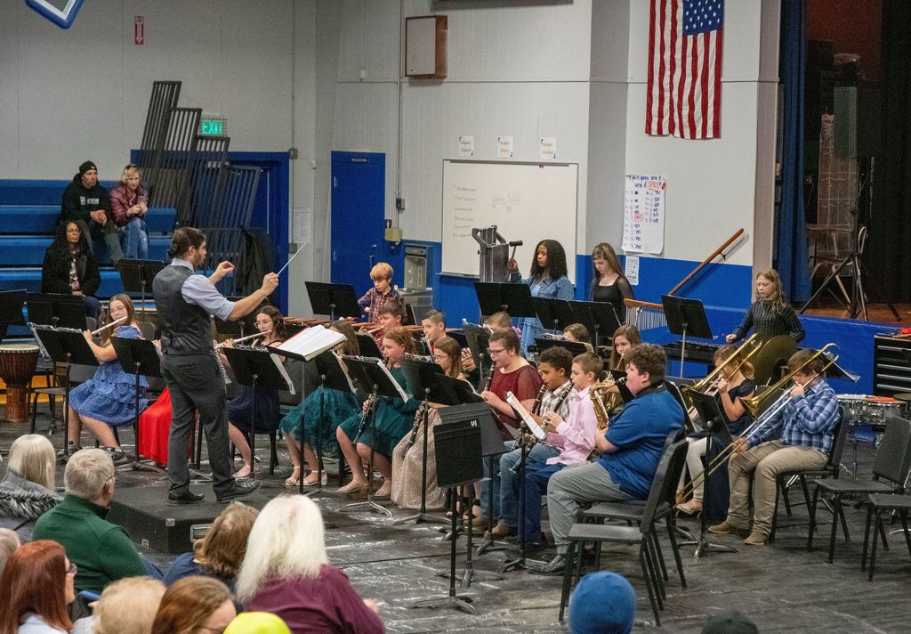 Middle and high school band students, under direction from Mr. Adam Park, perform holiday songs during the Union Star School Christmas concert.