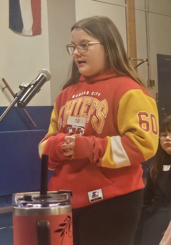 Kamryn Grace spells a word for the judges during the county bee.