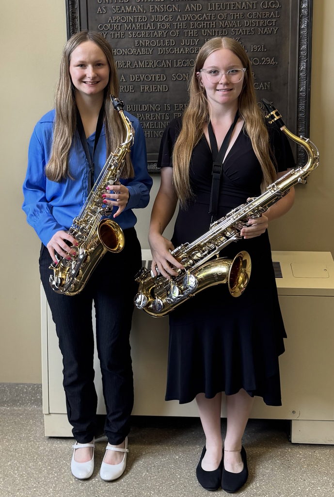 Image of two students at the State Music Festival.