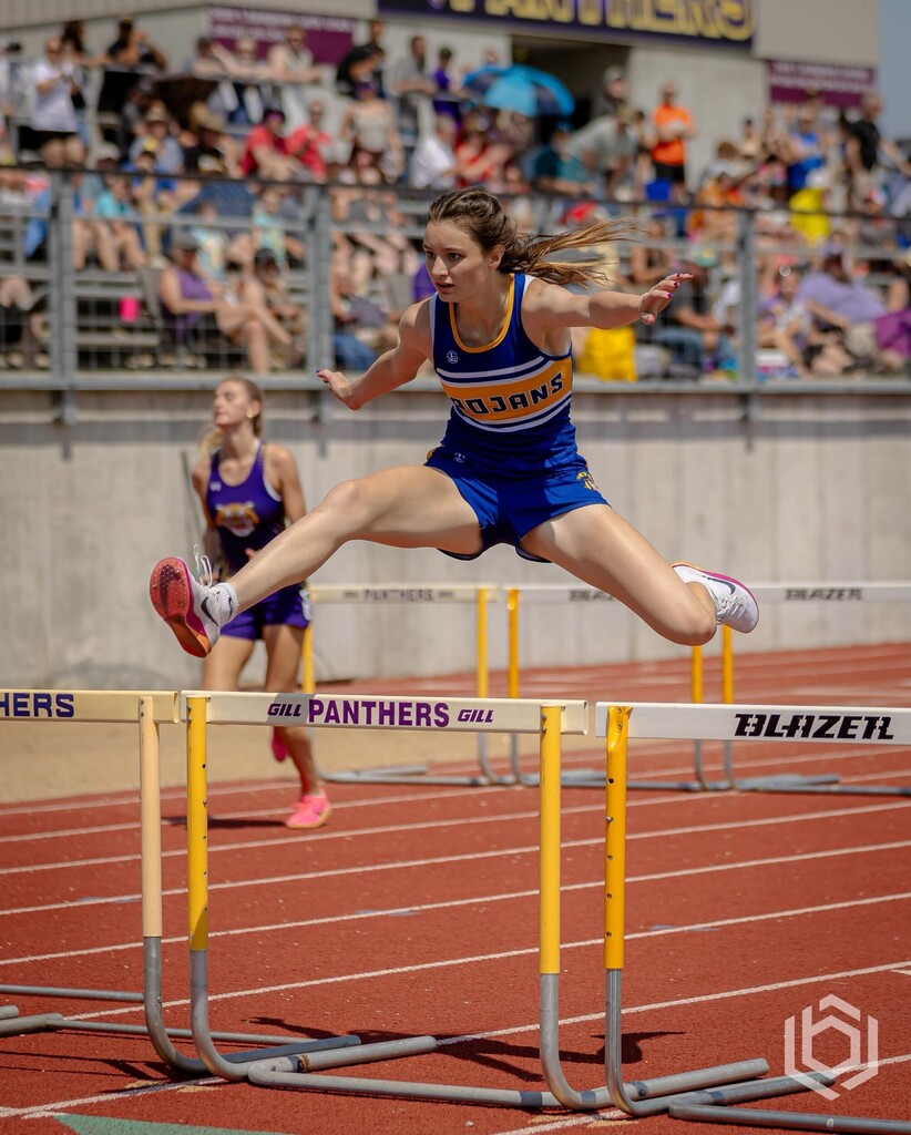 Remie jumping a hurdle at her sectional meet.