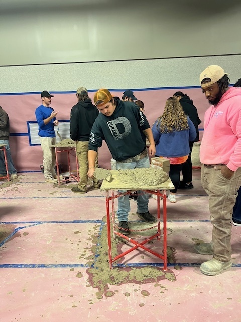 Students practicing masonry work