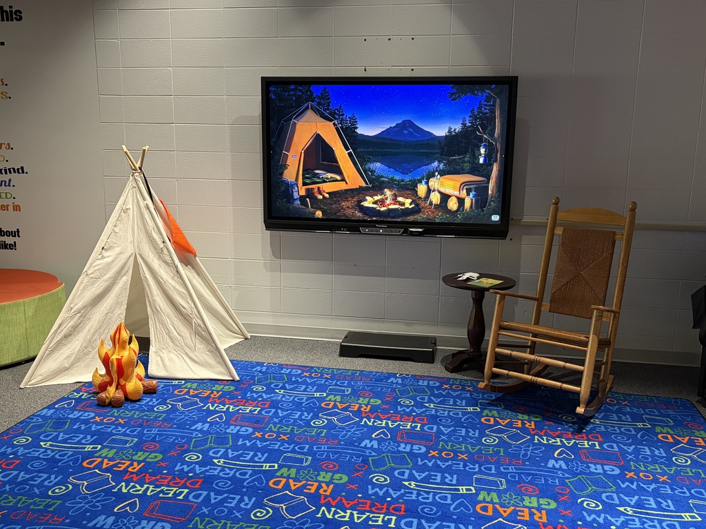Reading is S'more fun by the campfire