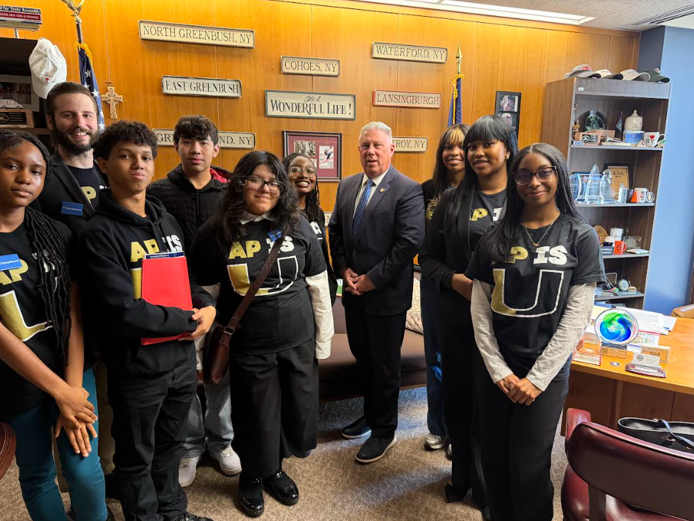 students in Albany with government offical