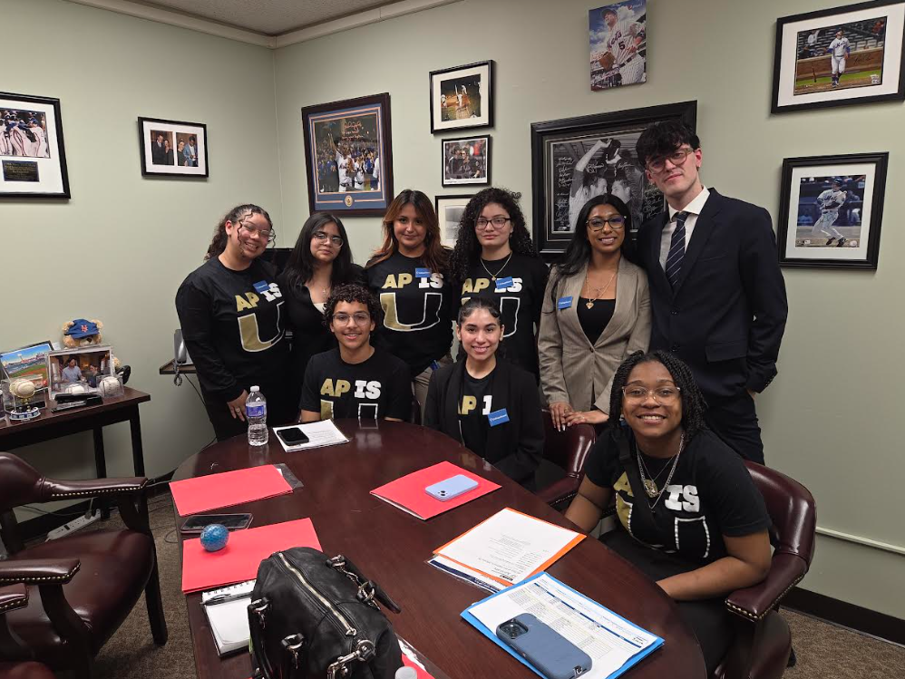 students standing by desk
