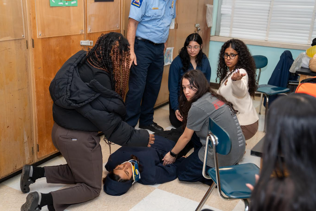 Students practicing medical aid