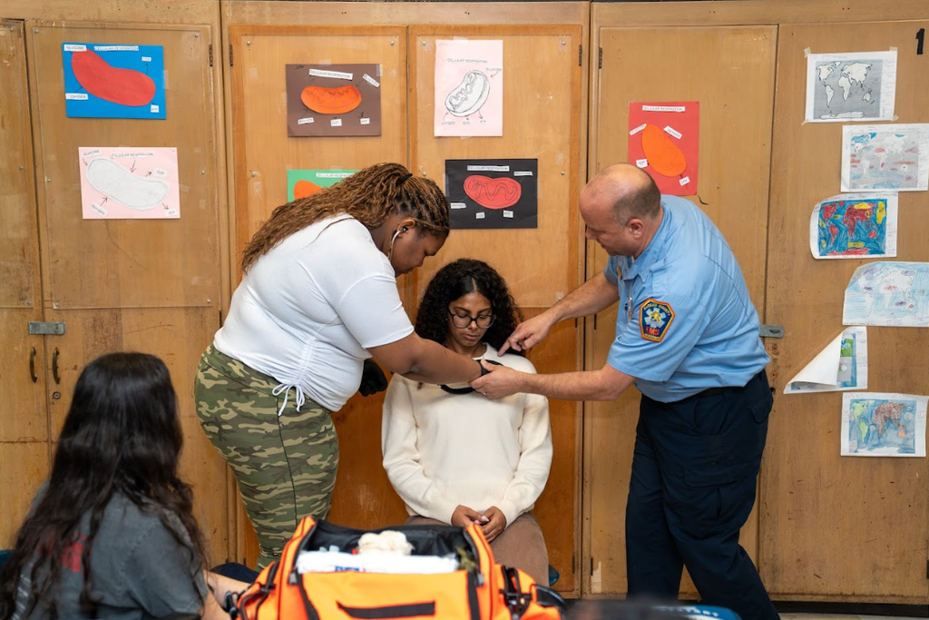 Students practicing medical aid