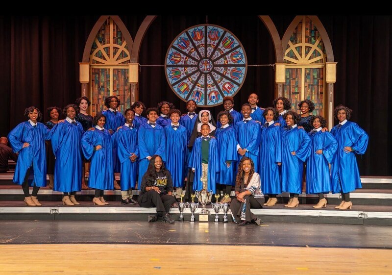 Uniondale’s Rhythm of the Night show choir with its awards at the Show Choir of America competition. Courtesy Lynnette Carr-Hicks
