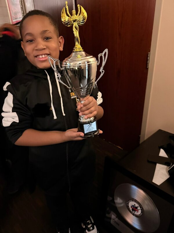 Ruben “RJ” Campbell Jr. with his trophy after winning Best Male Vocalist at the Show Choir of America competition on March 21. Courtesy Lynnette Carr-Hicks