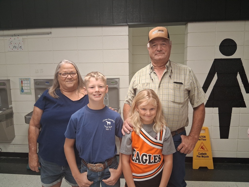 Grandparents waiting with WBE students
