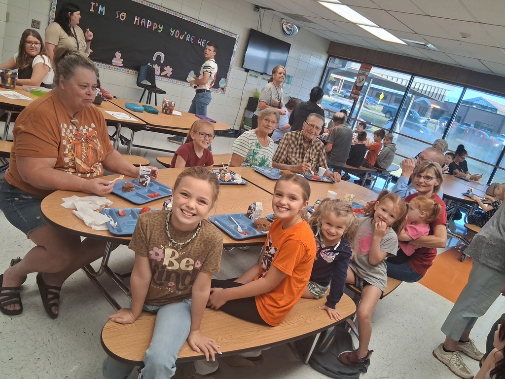 Great-grandparents and grandma's eating breakfast with the girls