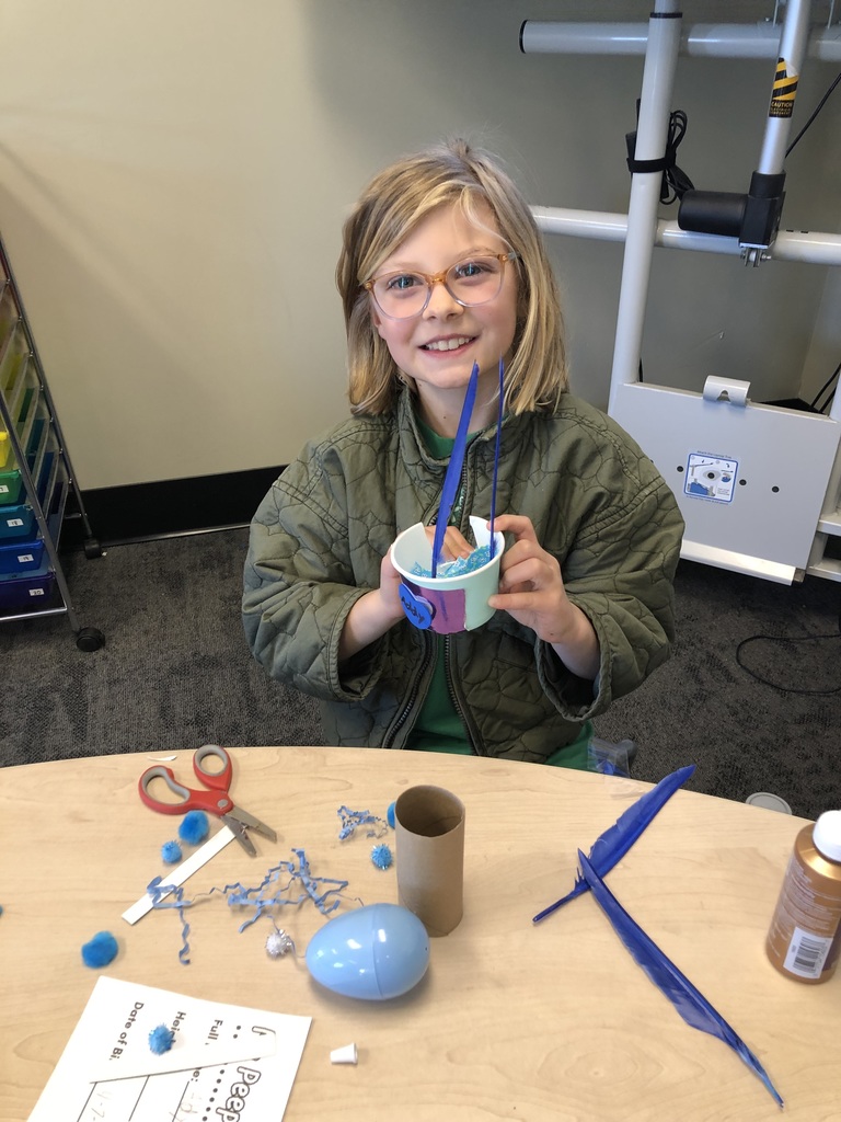 third grader working on a project
