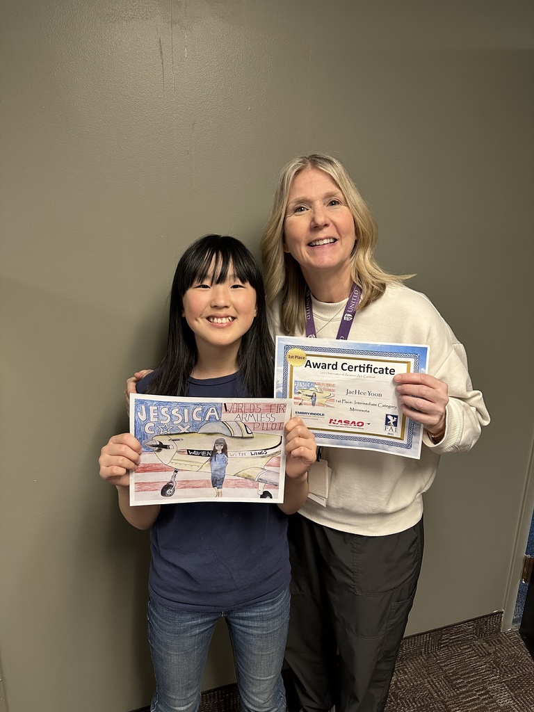 sixth grader with her art teacher