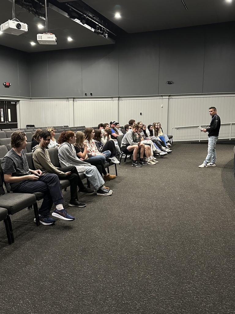 head of school talking to senior class