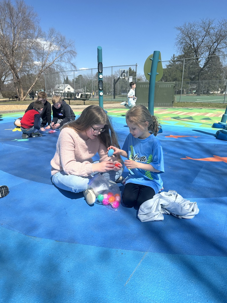 elementary students on an egg hunt