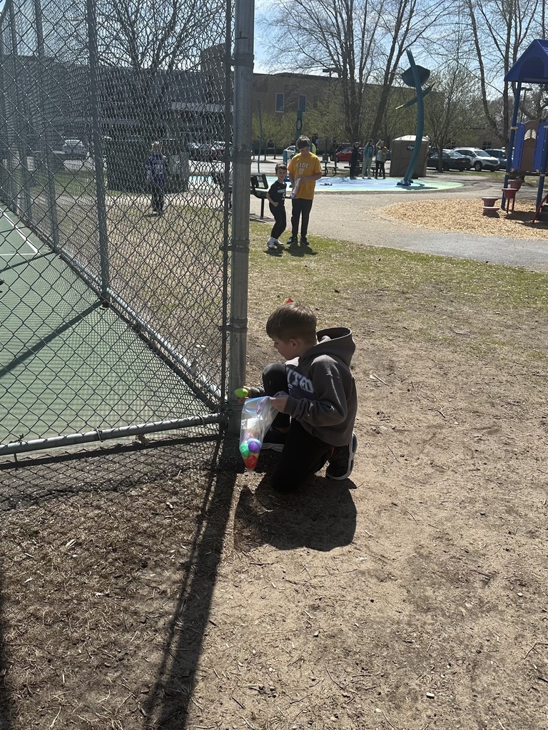 elementary students on an egg hunt