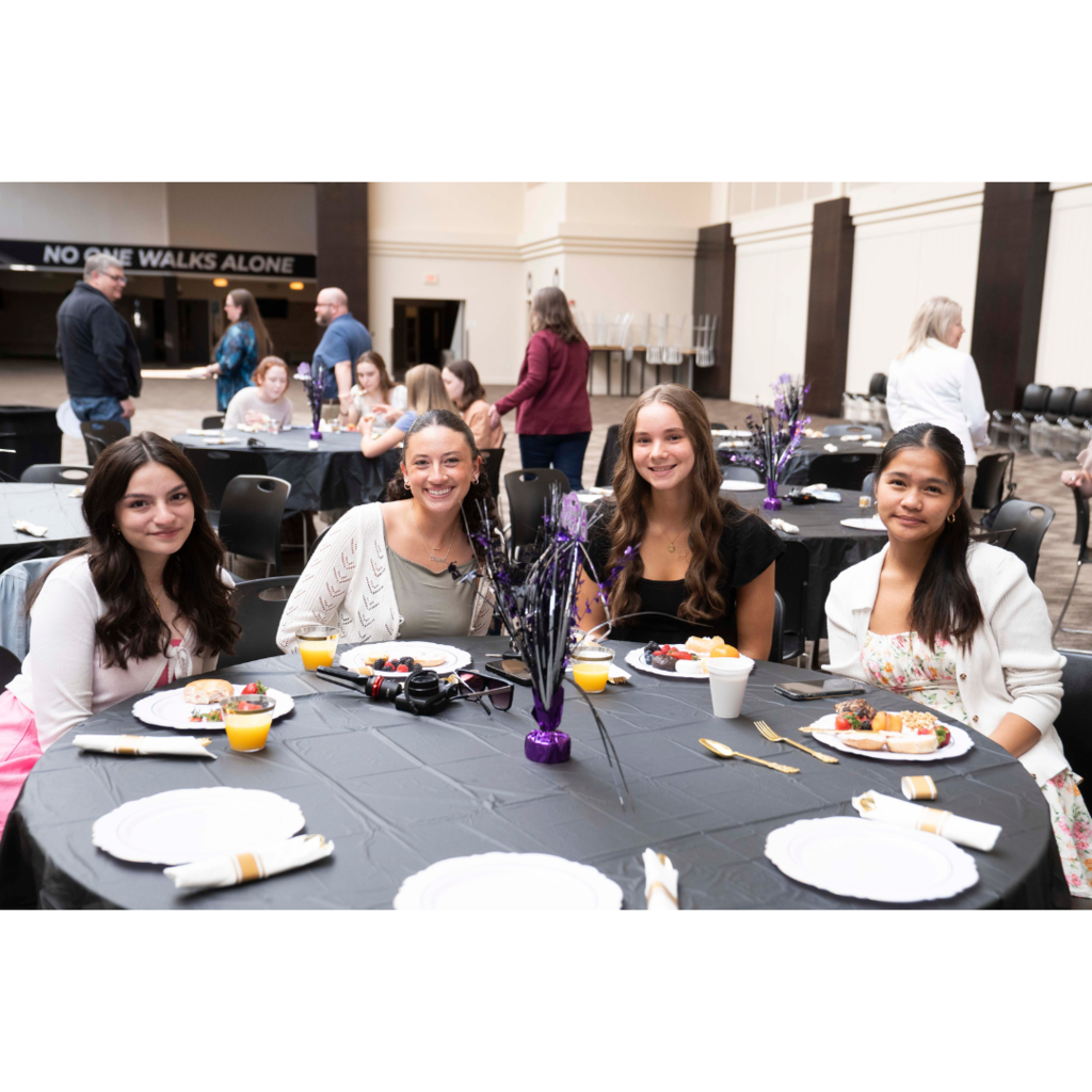 group of seniors sitting at a table