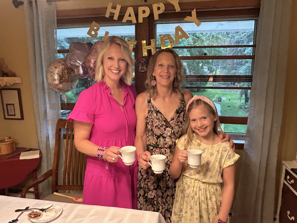 three generations of women at a tea party