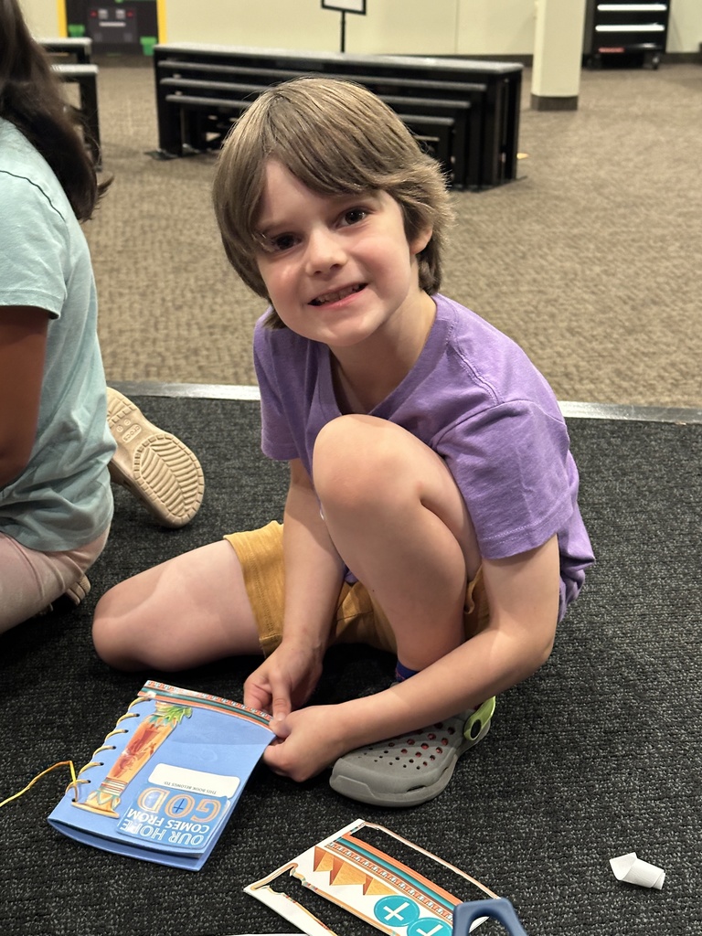 young student making a bible journal