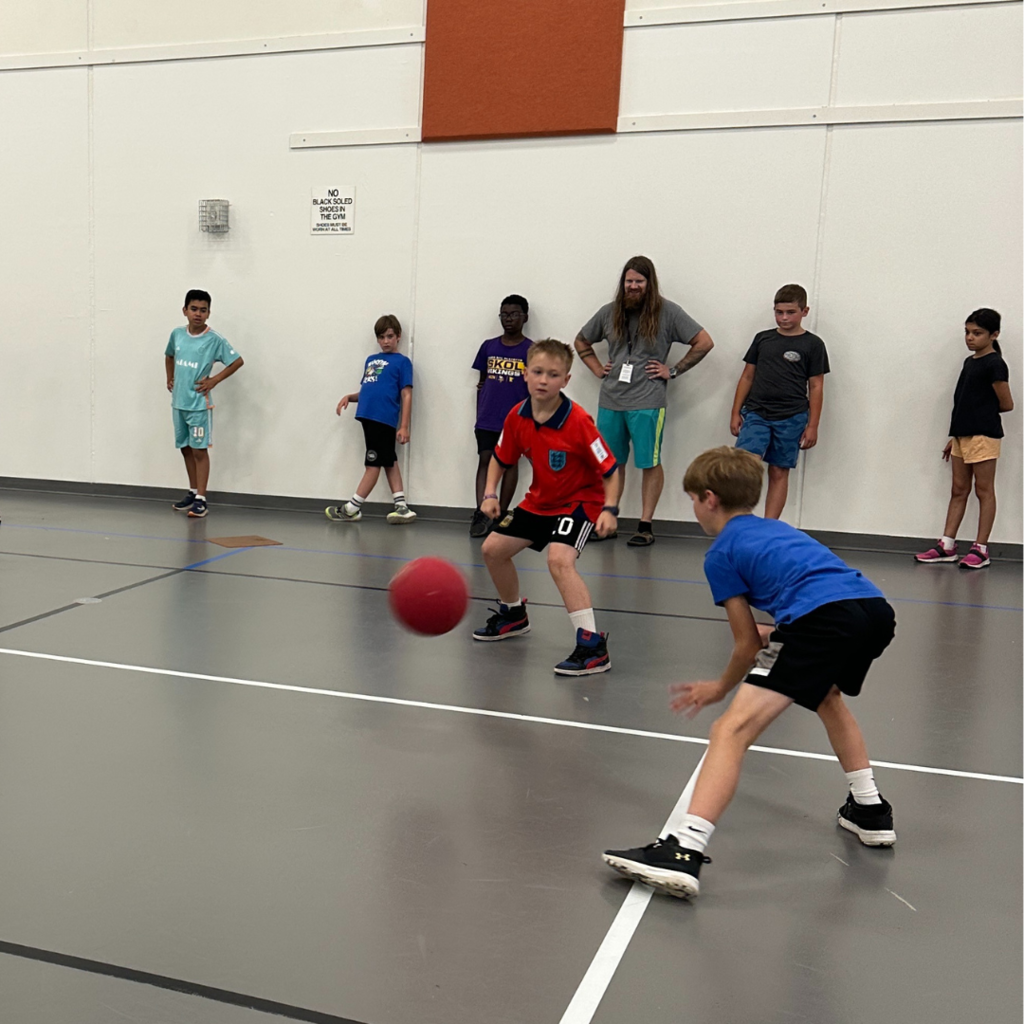 students playing 4 square