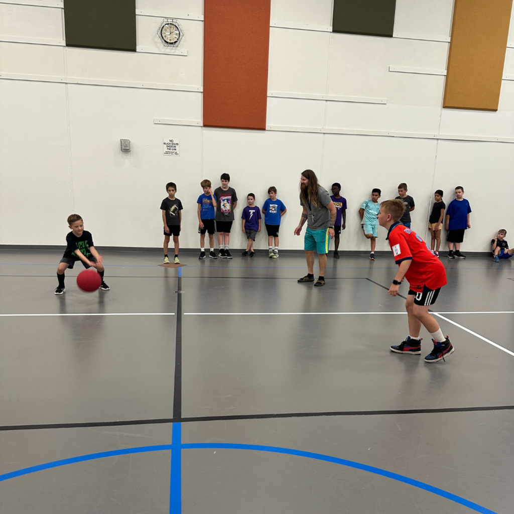 students playing 4 square