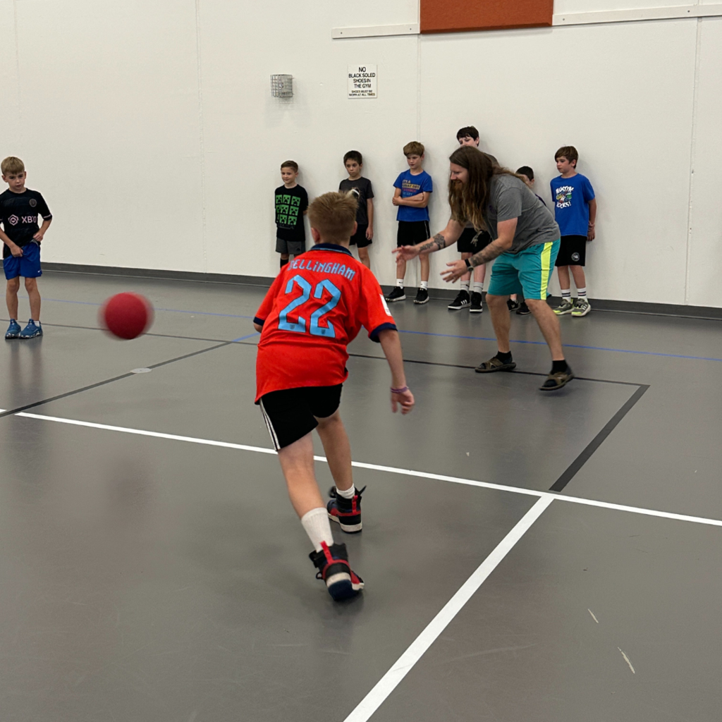 students playing 4 square