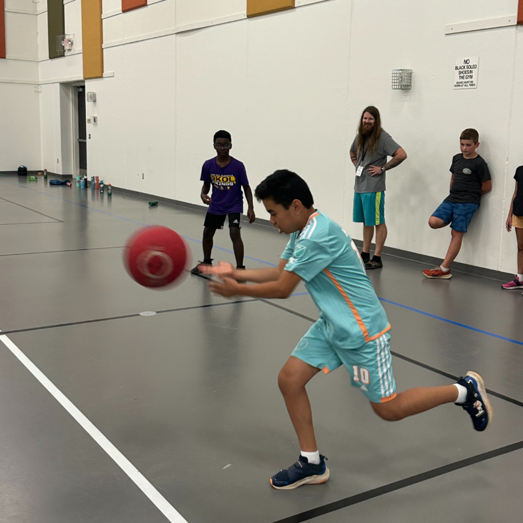 students playing 4 square