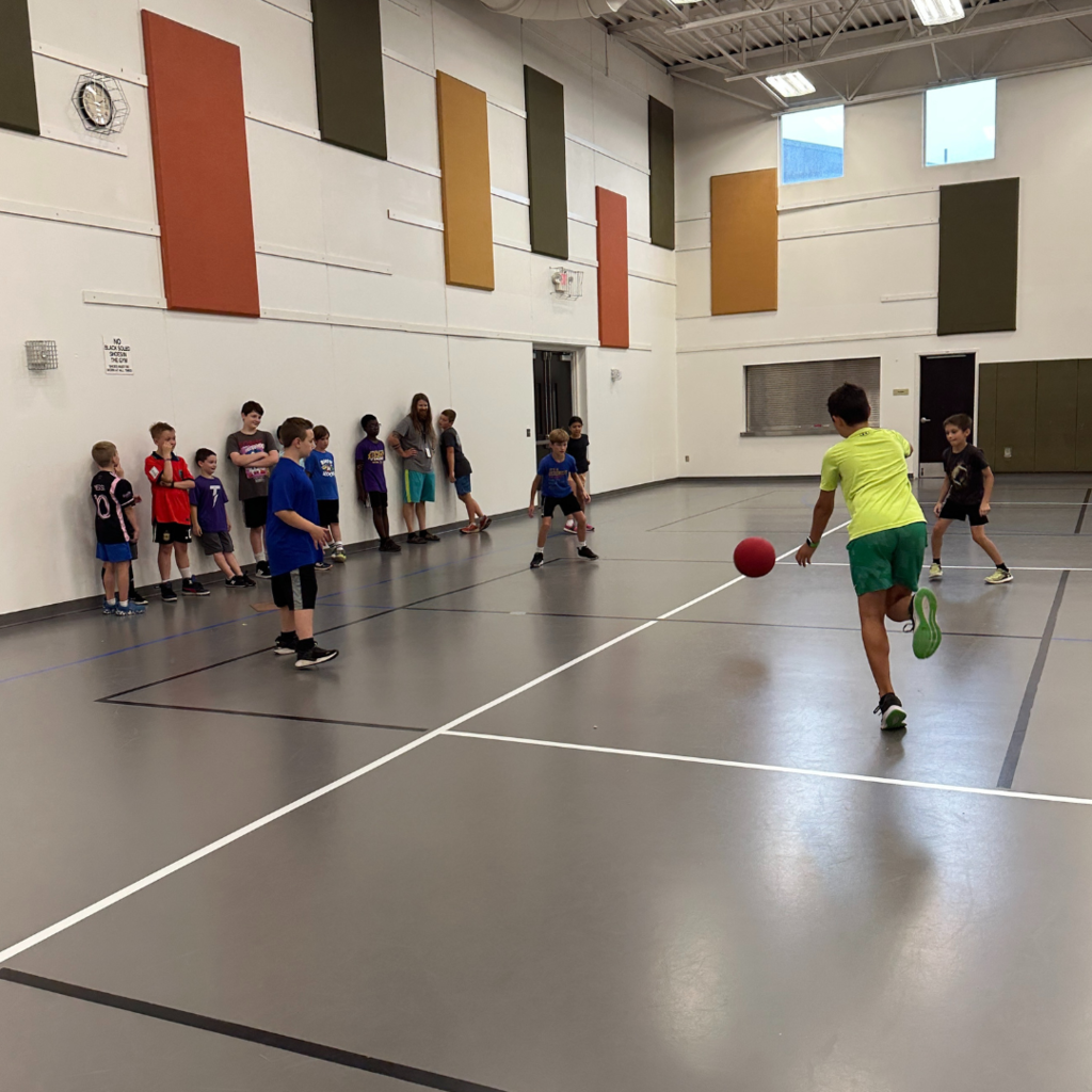 students playing 4 square