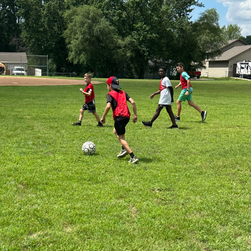 students playing soccer