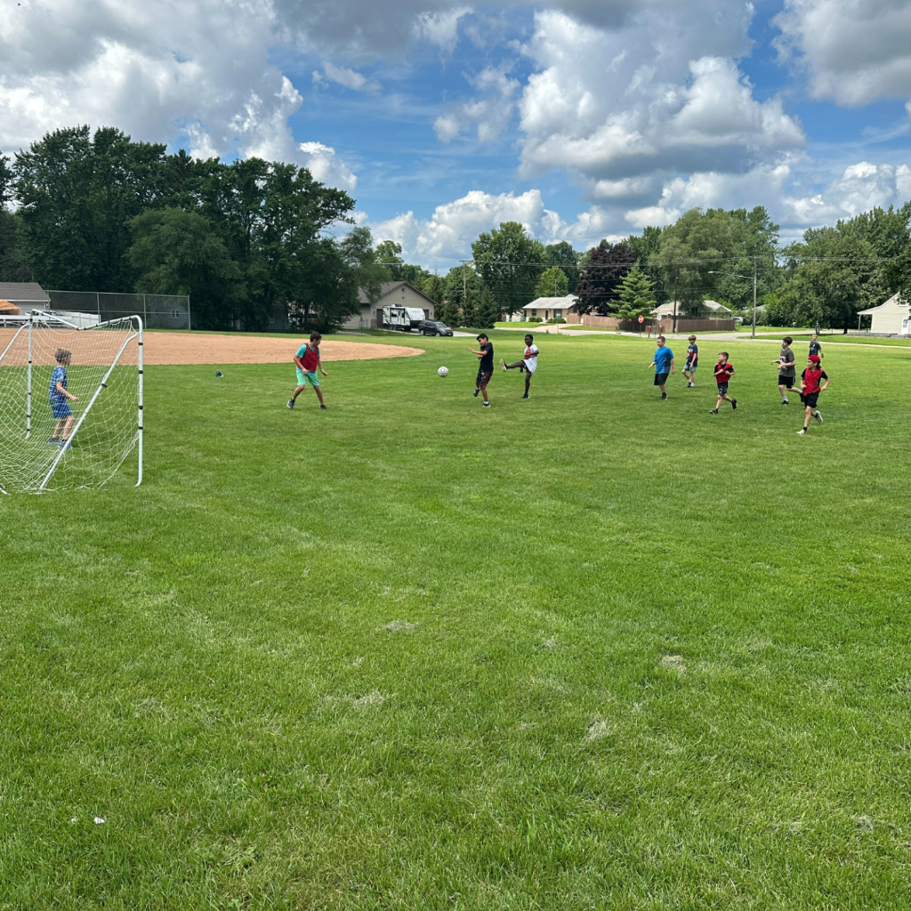 students playing soccer