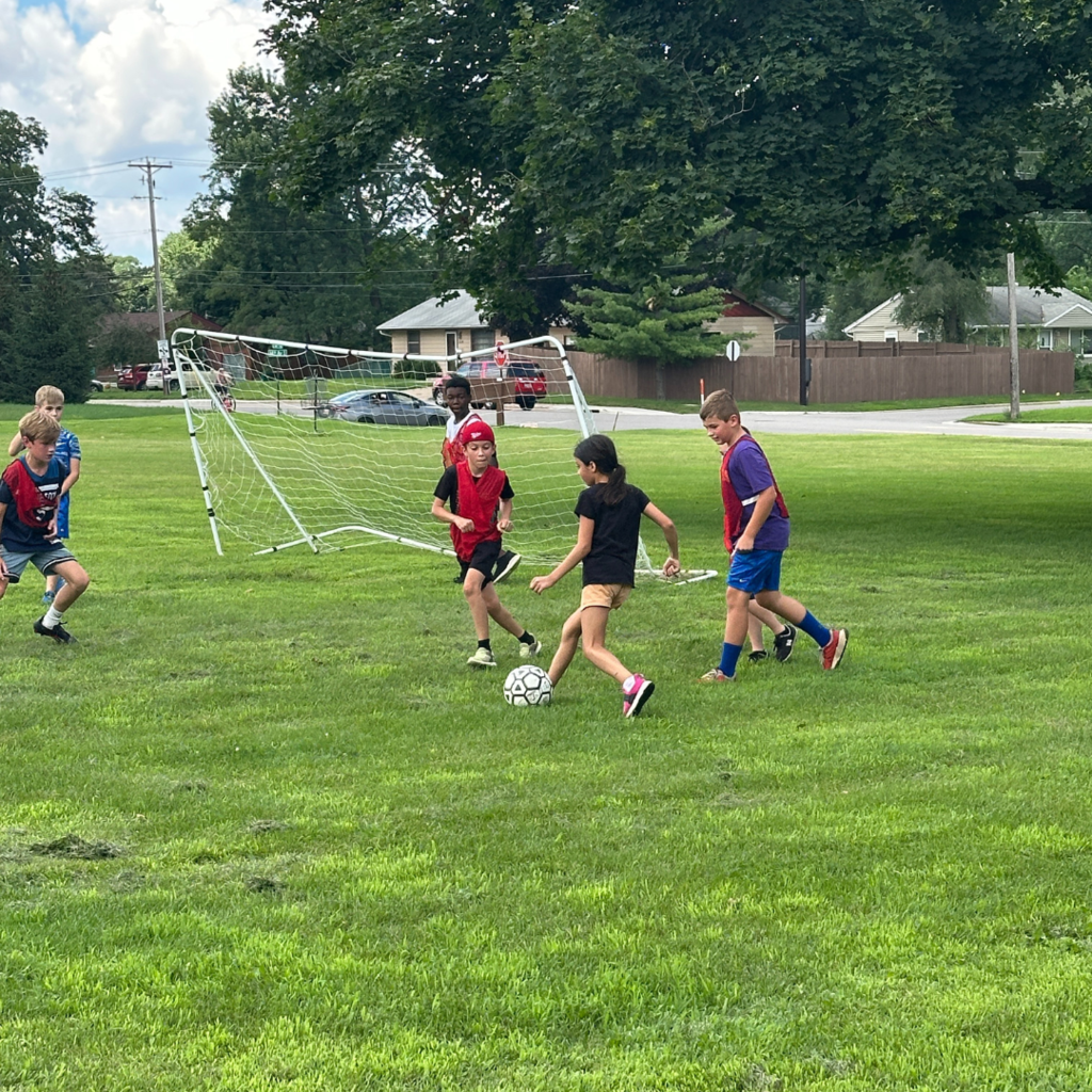 students playing soccer