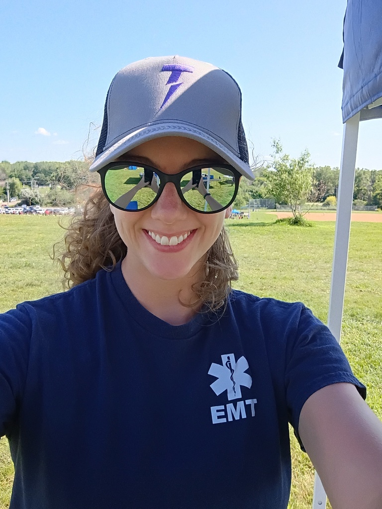selfie of a high school science teacher at a lacrosse tournament working as an EMT