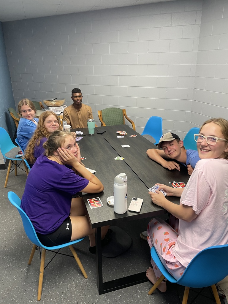 group of students playing Uno