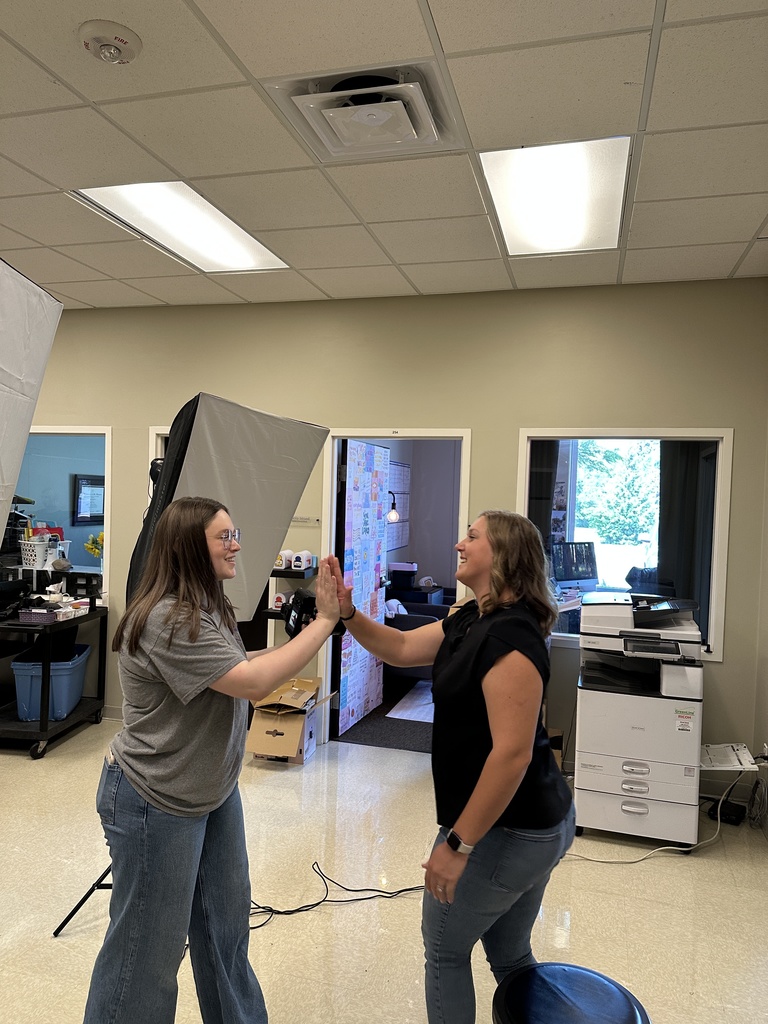 staff member having her head shot taken