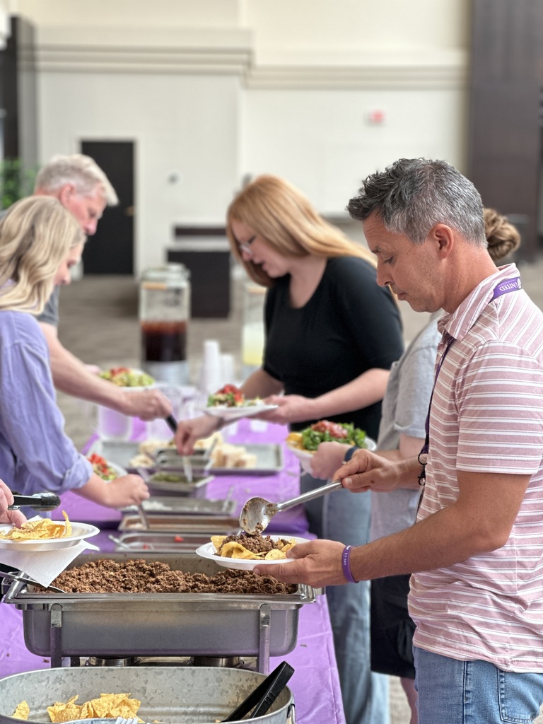 staff dishing up food for lunch