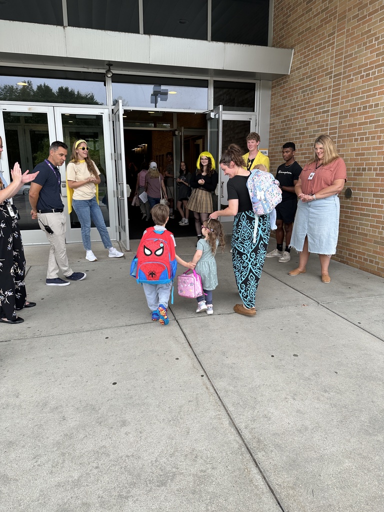 family walking into school on the first day