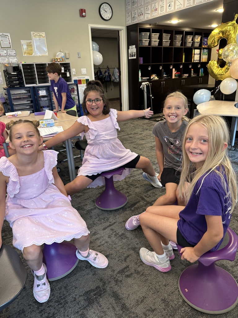four 3rd grade girls smiling for the camera