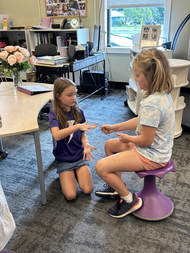 students playing rock, paper, scissors