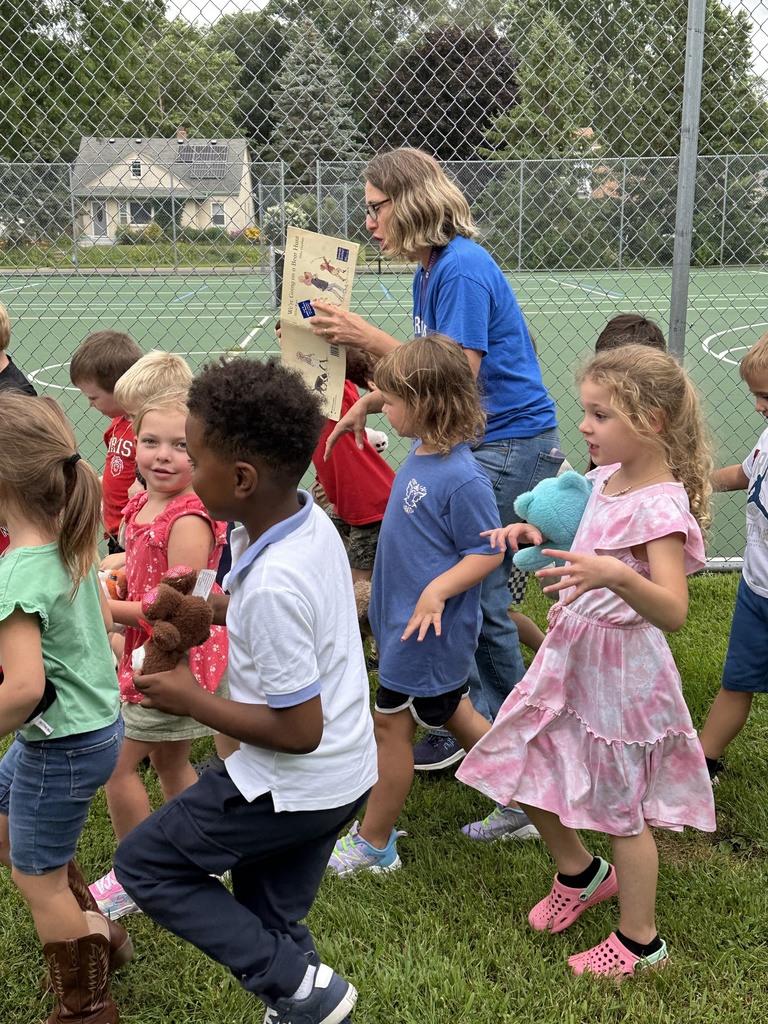 students and a teacher going on a 'bear hunt' while they read the book of the same title