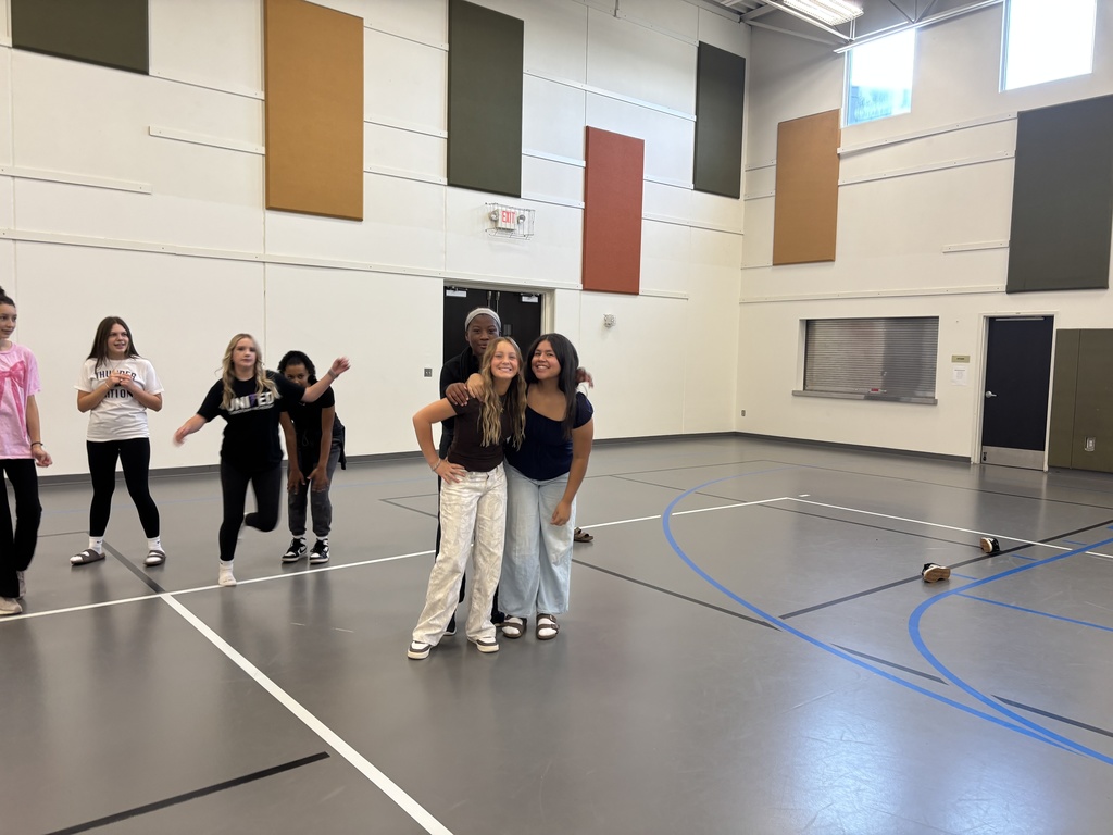 8th grade girls playing Four Square