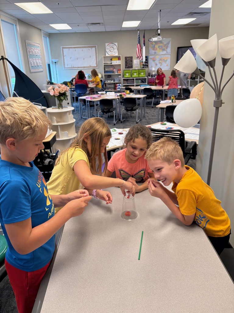3rd grade students working on a project to strengthen problem solving skills and teamwork