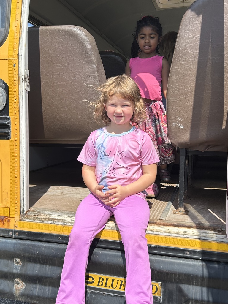 student practicing exiting the back of the bus
