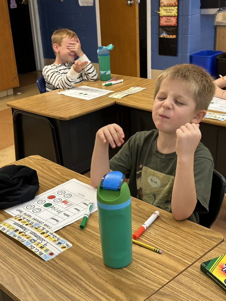 student making a funny face after tasting a lemon