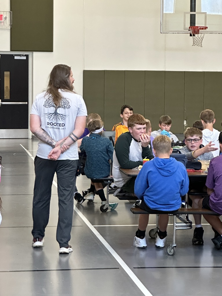 teacher supervising in the cafeteria
