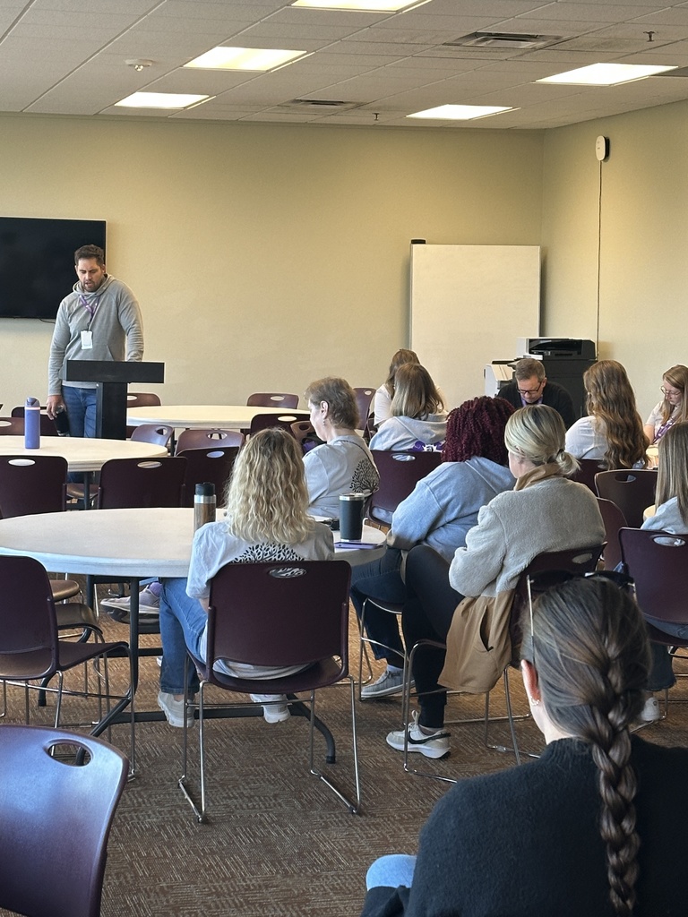 group of staff gathering for devotions