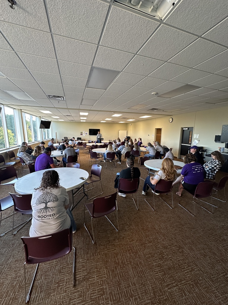 group of staff gathering for devotions