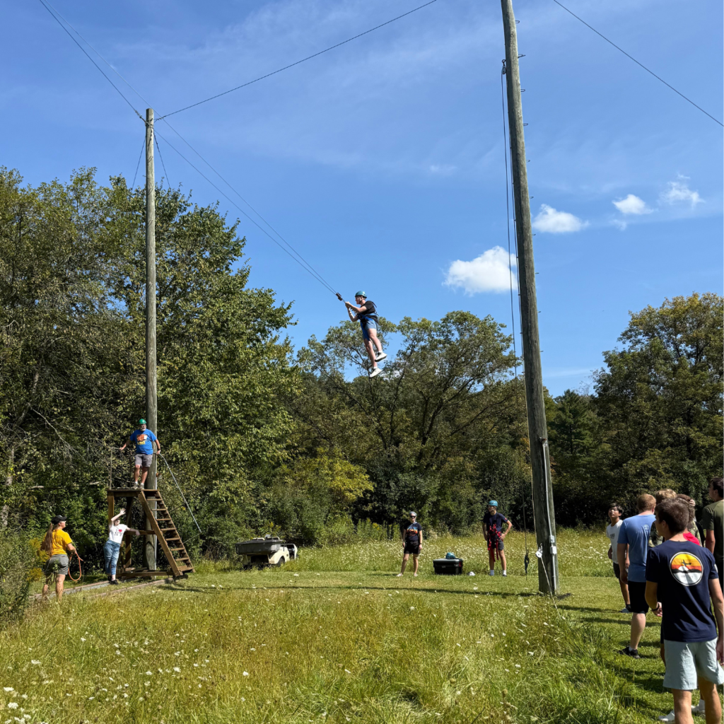 high school students on a giant swing