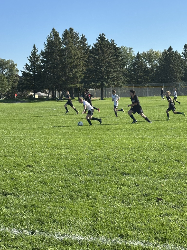 middle school boys playing soccer