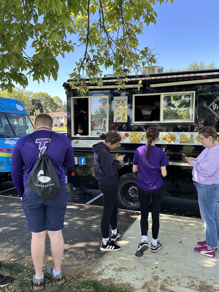 students ordering at a food truck