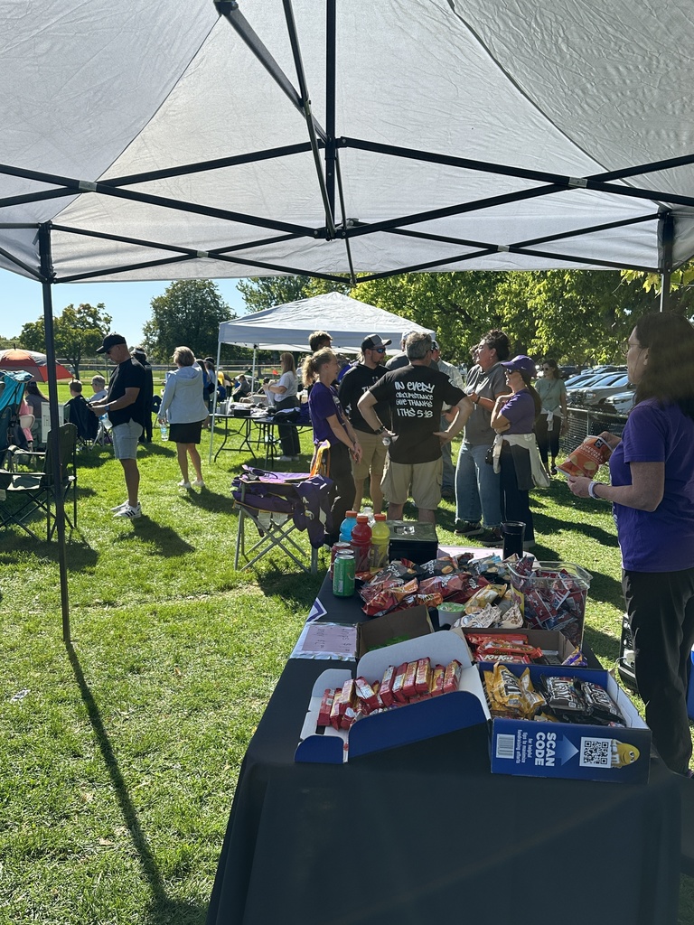 fans and a concession stand at a soccer game